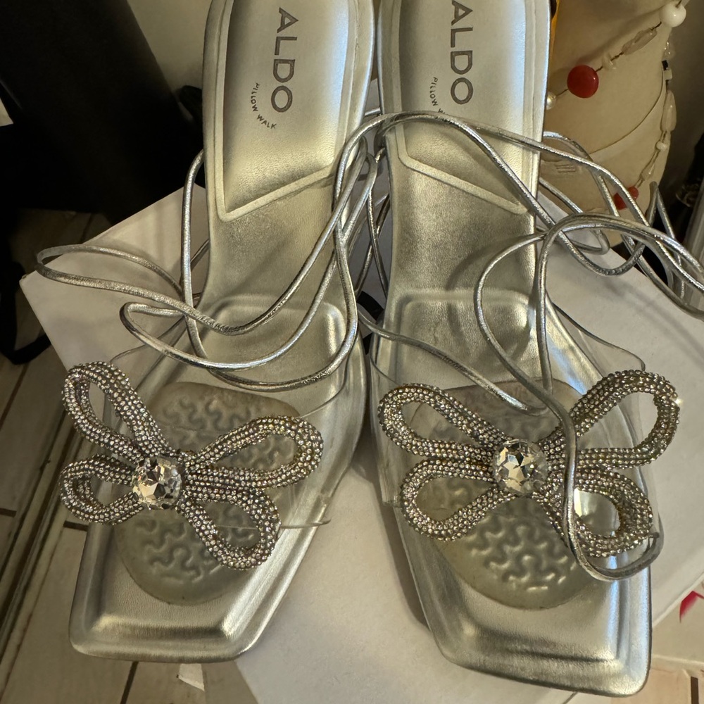 Sliver Aldo Steppy heels used ones